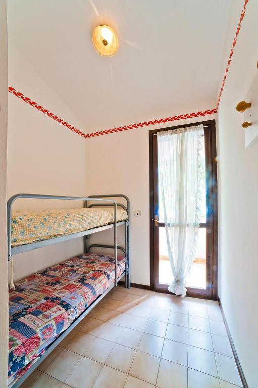 Residence Cinzia Pool Bibione Habitación foto